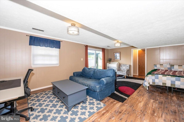 4117 Charley Forest St, Olney, MD 20832 - bedroom with wood finished floors, wooden walls, access to outside, and ornamental molding
