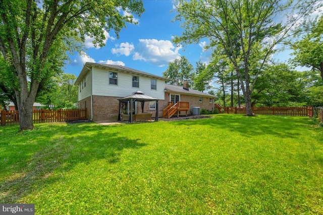 4117 Charley Forest St, Olney, MD 20832 - back of property with a gazebo, brick siding, and a chimney