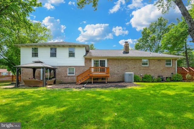 4117 Charley Forest St, Olney, MD 20832 - back of property featuring a gazebo, central AC unit, stairs, brick siding, and a chimney