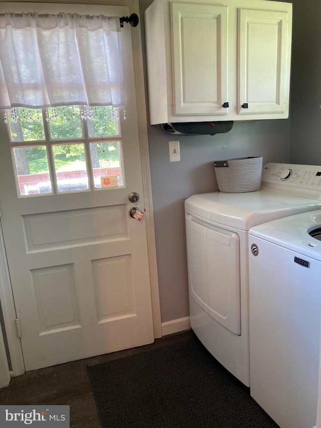4117 Charley Forest St, Olney, MD 20832 - washroom featuring cabinet space, washing machine and dryer, and dark wood-style floors