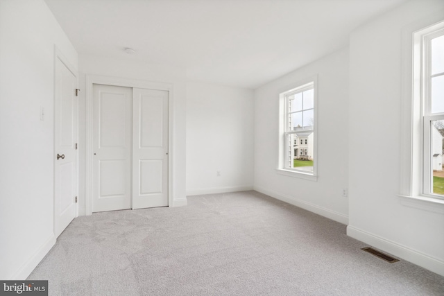 4338 Taviston Ct E, Emmaus, PA 18049 - unfurnished bedroom with carpet, baseboards, and a closet