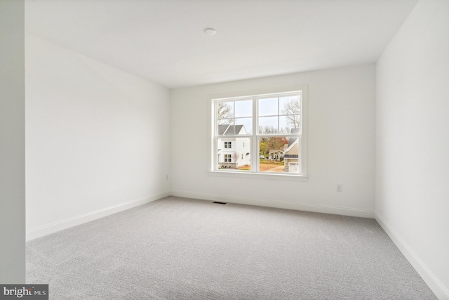 4338 Taviston Ct E, Emmaus, PA 18049 - empty room with light carpet and baseboards