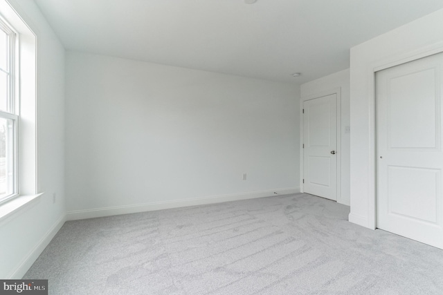 4338 Taviston Ct E, Emmaus, PA 18049 - unfurnished bedroom with carpet flooring, baseboards, and a closet