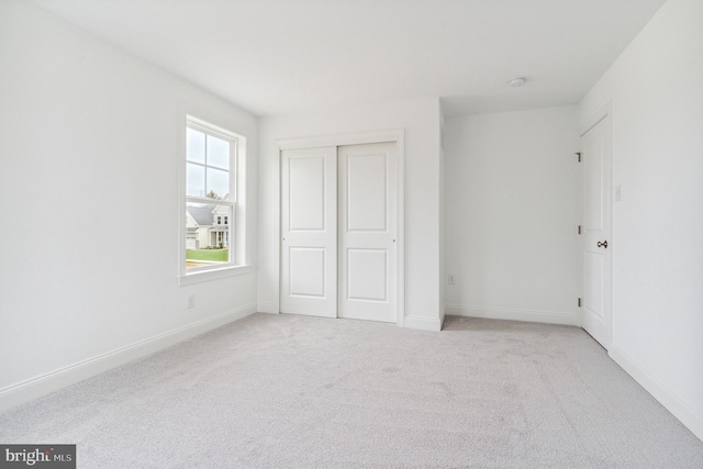4338 Taviston Ct E, Emmaus, PA 18049 - unfurnished bedroom featuring carpet, a closet, and baseboards