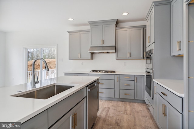 4338 Taviston Ct E, Emmaus, PA 18049 - kitchen featuring gray cabinetry, a sink, appliances with stainless steel finishes, light countertops, and recessed lighting
