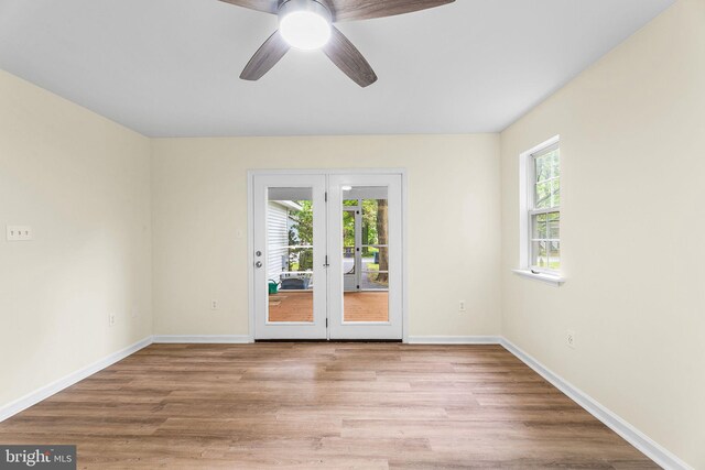 74 Bramblewood Dr, Ocean Pines, MD 21811 - spare room with wood finished floors, baseboards, and french doors