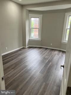 132 N 50th St, Philadelphia, PA 19139 - empty room featuring dark wood-type flooring, baseboards, and recessed lighting
