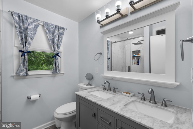 19 Norris Run Ct, Reisterstown, MD 21136 - bathroom featuring a stall shower, toilet, and double vanity