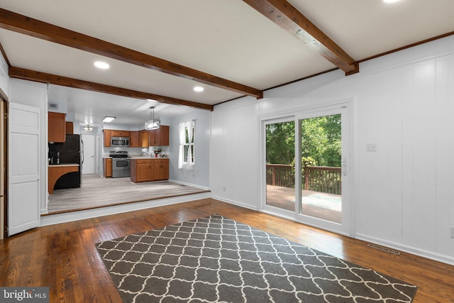 19 Norris Run Ct, Reisterstown, MD 21136 - unfurnished living room with healthy amount of natural light, wood finished floors, beam ceiling, recessed lighting, and baseboards