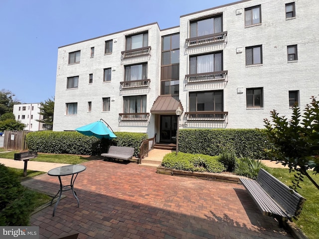 2610 Tunlaw Rd NW Unit 102, Washington, DC 20007 - view of apartment building / complex