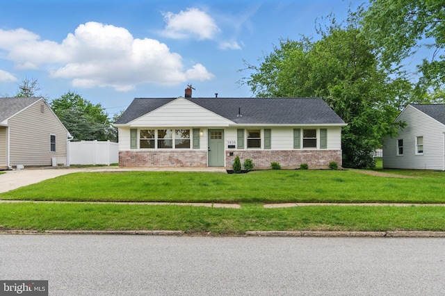 3835 Dresher Rd, Bensalem, PA 19020 - view of front of property with brick siding, a chimney, driveway, and a shingled roof