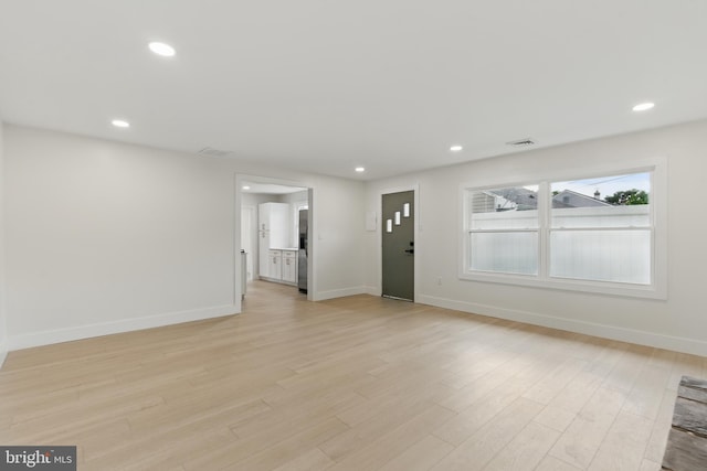 3835 Dresher Rd, Bensalem, PA 19020 - unfurnished living room featuring light wood-style floors, baseboards, and recessed lighting