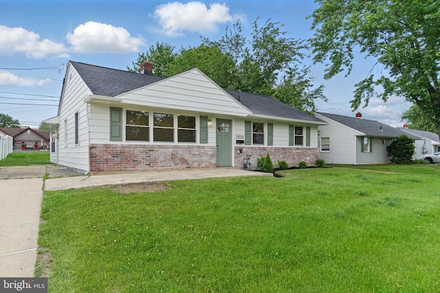 3835 Dresher Rd, Bensalem, PA 19020 - ranch-style home with brick siding, a front yard, a chimney, and roof with shingles