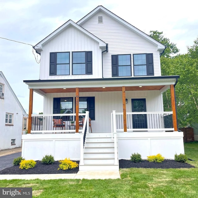 925 Merrick Ave, Haddon Twp, NJ 8108 - view of front of property featuring a porch and board and batten siding