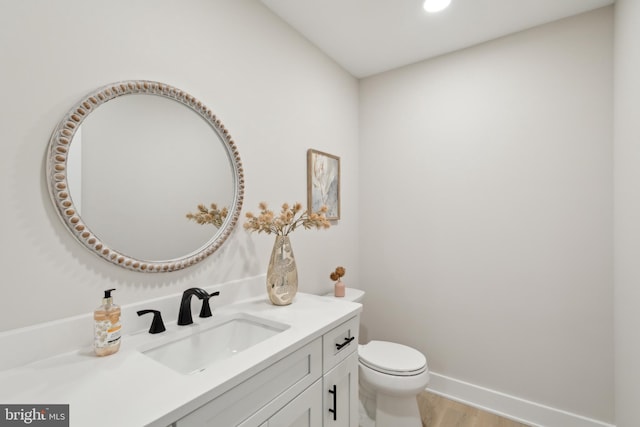 925 Merrick Ave, Haddon Twp, NJ 8108 - half bath featuring wood finished floors, vanity, toilet, baseboards, and recessed lighting