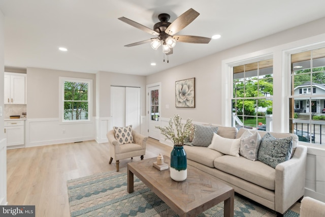 925 Merrick Ave, Haddon Twp, NJ 8108 - living area with light wood-style floors, a ceiling fan, a wainscoted wall, and recessed lighting