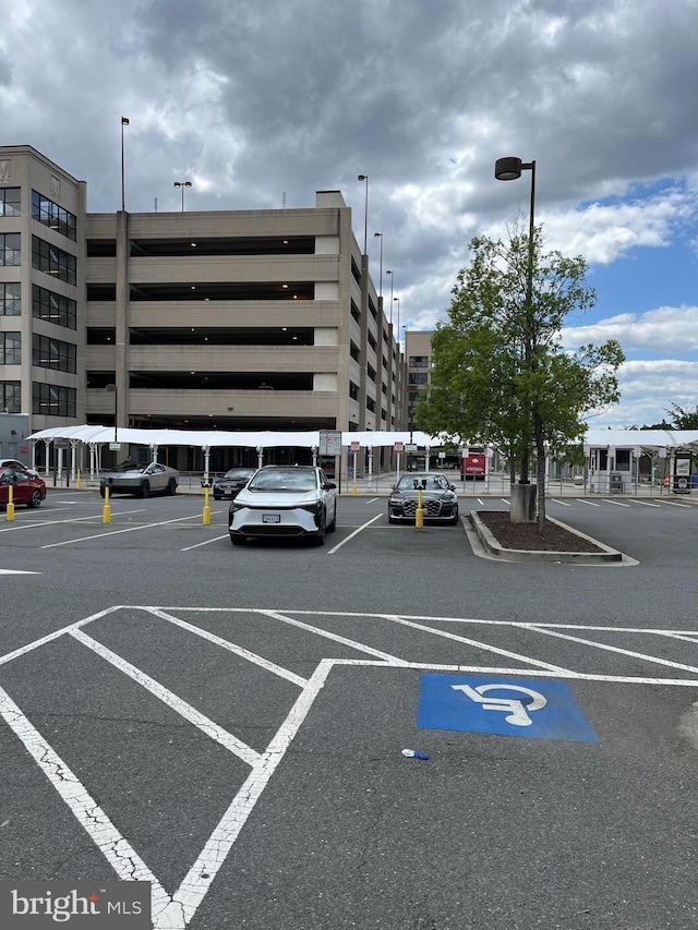 2720 Bellforest Ct Unit 201, Vienna, VA 22180 - view of building exterior with uncovered parking