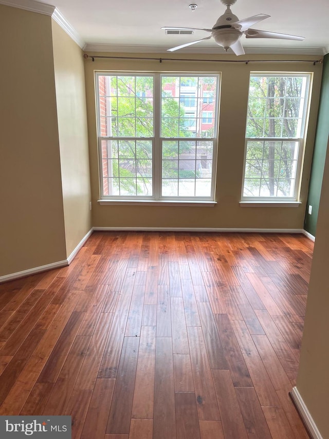 2720 Bellforest Ct Unit 201, Vienna, VA 22180 - unfurnished room featuring a ceiling fan, crown molding, wood-type flooring, baseboards, and fire sprinkler in ceiling