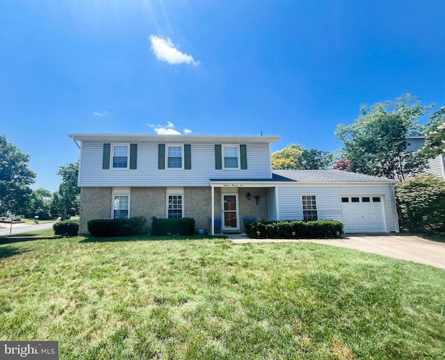 1901 Champlain Dr, Severn, MD 21144 - view of front of property featuring a garage, concrete driveway, and a front lawn