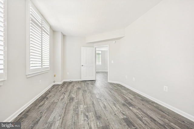 4480 Market Commons Dr Unit 416, Fairfax, VA 22033 - empty room featuring wood finished floors and baseboards