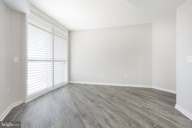 4480 Market Commons Dr Unit 416, Fairfax, VA 22033 - empty room with wood finished floors and baseboards