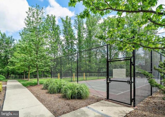 4480 Market Commons Dr Unit 416, Fairfax, VA 22033 - view of tennis court featuring a gate