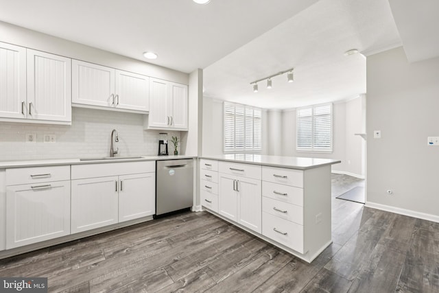 4480 Market Commons Dr Unit 416, Fairfax, VA 22033 - kitchen with stainless steel dishwasher, a sink, a peninsula, white cabinetry, and recessed lighting