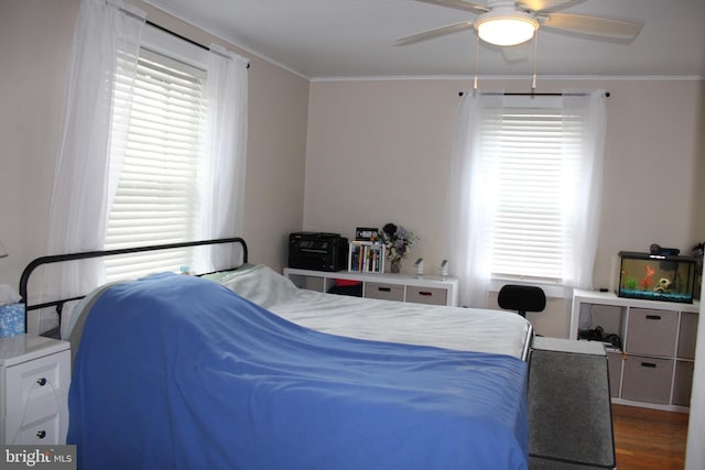 601 W Main St, New Holland, PA 17557 - bedroom with crown molding, multiple windows, wood finished floors, and a ceiling fan