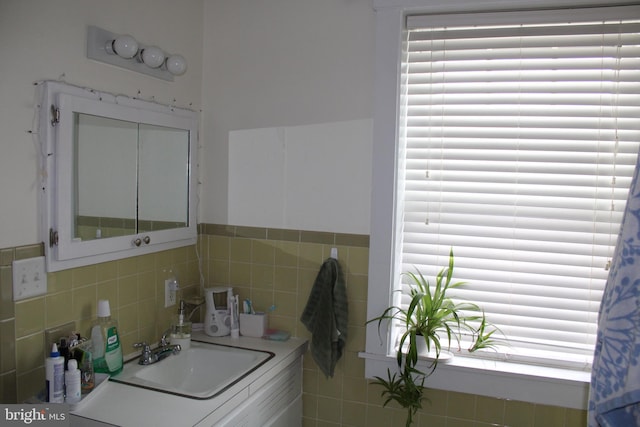 601 W Main St, New Holland, PA 17557 - bathroom with vanity and tile walls