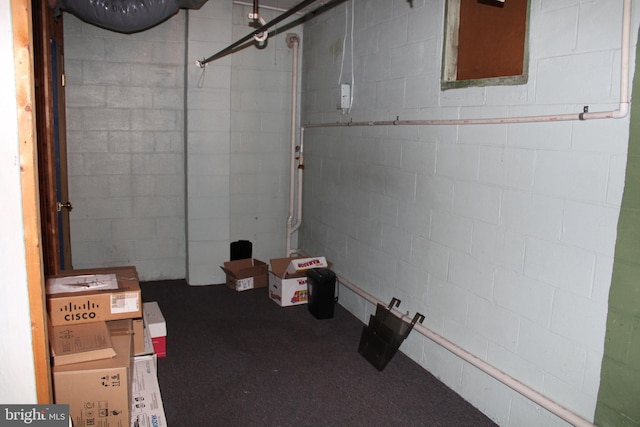 601 W Main St, New Holland, PA 17557 - unfinished basement featuring concrete block wall and carpet