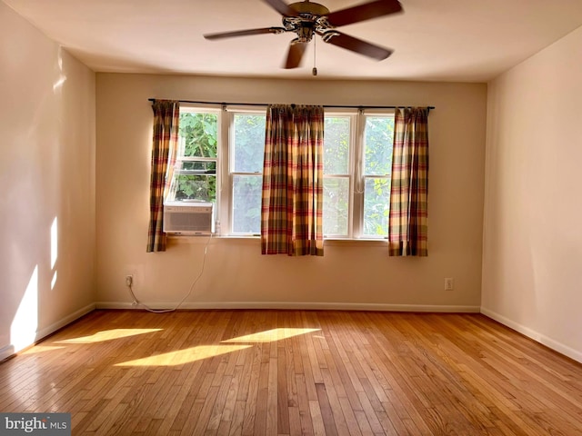 7200 Highland St, Springfield, VA 22150 - empty room featuring wood-type flooring, a ceiling fan, baseboards, and cooling unit
