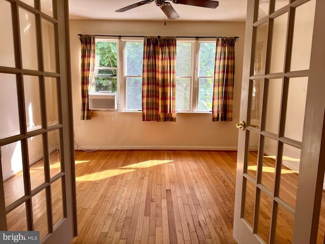 7200 Highland St, Springfield, VA 22150 - spare room with a ceiling fan, hardwood / wood-style floors, baseboards, and cooling unit