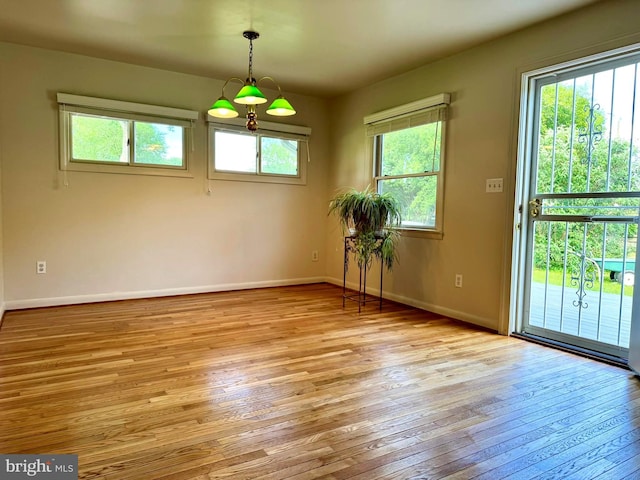 7200 Highland St, Springfield, VA 22150 - empty room with light wood finished floors, healthy amount of natural light, and baseboards