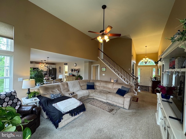 7 Red Fox Ct, Reinholds, PA 17569 - living room featuring a chandelier, carpet, stairway, high vaulted ceiling, and ceiling fan
