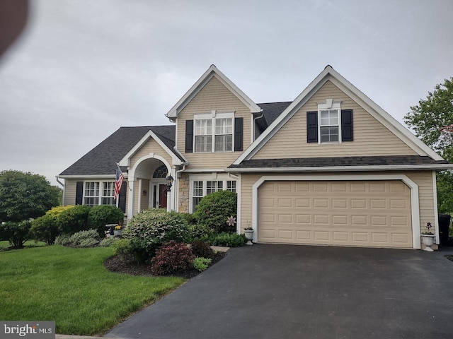 7 Red Fox Ct, Reinholds, PA 17569 - traditional-style home with asphalt driveway and a front lawn