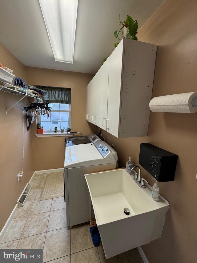 7 Red Fox Ct, Reinholds, PA 17569 - laundry area with cabinet space, washing machine and clothes dryer, and baseboards