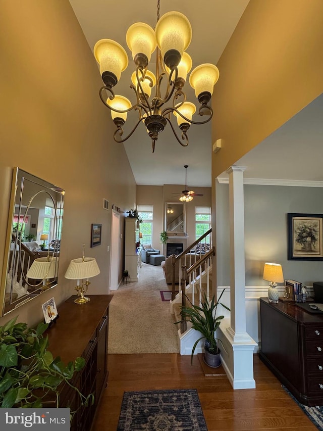 7 Red Fox Ct, Reinholds, PA 17569 - corridor with a chandelier, high vaulted ceiling, wood finished floors, and decorative columns