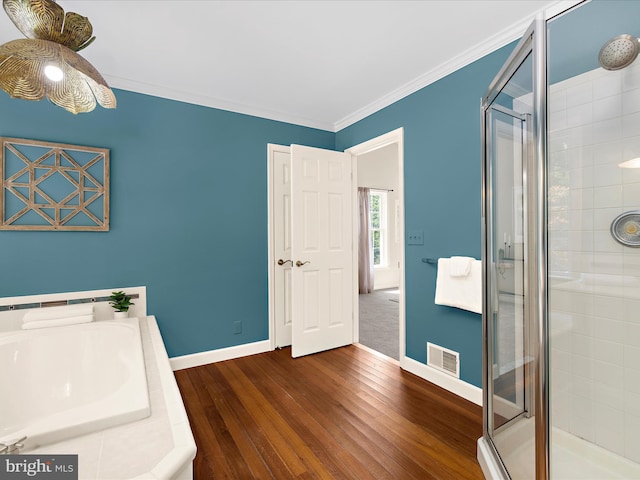 3501 Marthas Vineyard Way, Edgewater, MD 21037 - bathroom featuring a stall shower, wood-type flooring, baseboards, and crown molding