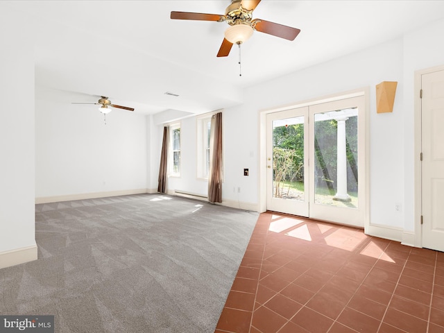 3501 Marthas Vineyard Way, Edgewater, MD 21037 - carpeted spare room featuring a ceiling fan, a baseboard heating unit, baseboards, and tile patterned flooring
