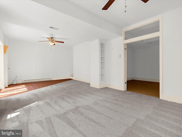 3501 Marthas Vineyard Way, Edgewater, MD 21037 - unfurnished living room featuring a ceiling fan, a baseboard radiator, carpet floors, baseboards, and built in features