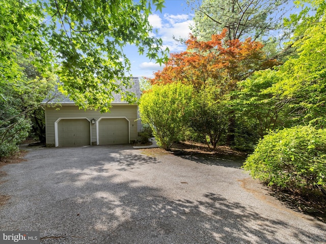 3501 Marthas Vineyard Way, Edgewater, MD 21037 - obstructed view of property featuring asphalt driveway
