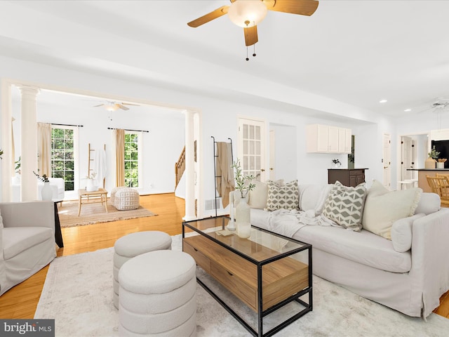 3501 Marthas Vineyard Way, Edgewater, MD 21037 - living room with a ceiling fan, light wood-style flooring, ornate columns, recessed lighting, and stairway