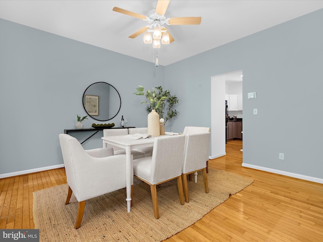 3501 Marthas Vineyard Way, Edgewater, MD 21037 - dining space with light wood-style flooring, baseboards, and ceiling fan