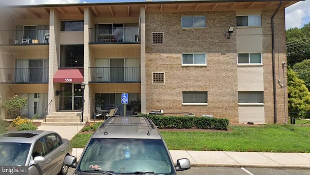 5500 Karen Elaine Dr Unit 910, Hyattsville, MD 20784 - view of apartment building / complex with uncovered parking