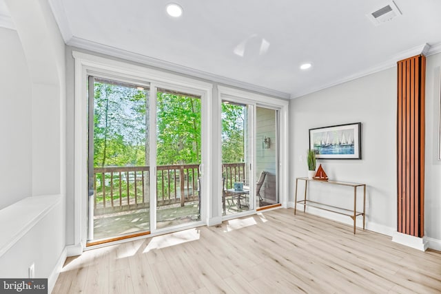 1104 Back Creek Loop Unit 1104, Solomons, MD 20688 - entryway featuring plenty of natural light, ornamental molding, baseboards, wood finished floors, and recessed lighting