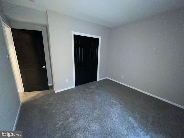 29075 Autumnwood Dr, Mechanicsville, MD 20659 - unfurnished bedroom with carpet flooring, baseboards, and a closet