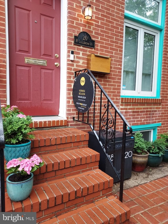 20 N Collington Ave, Baltimore, MD 21231 - doorway to property with brick siding