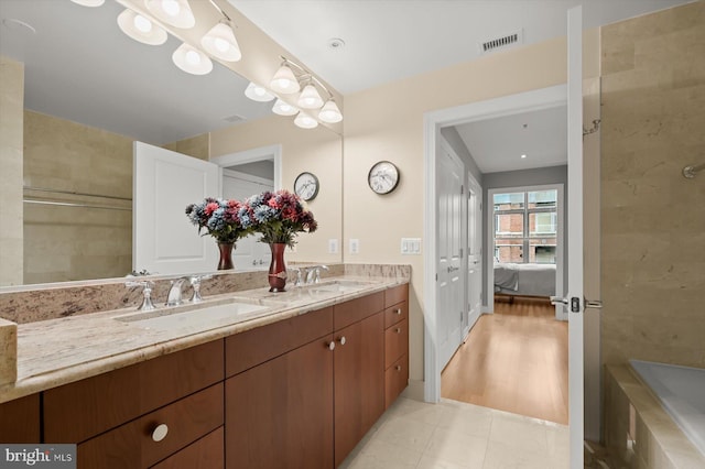 2425 L St NW Unit 623, Washington, DC 20037 - full bath featuring ensuite bathroom, double vanity, and a bath