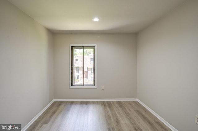 5241 W Running Brook Rd Unit 302, Columbia, MD 21044 - spare room with light wood-style floors, recessed lighting, and baseboards