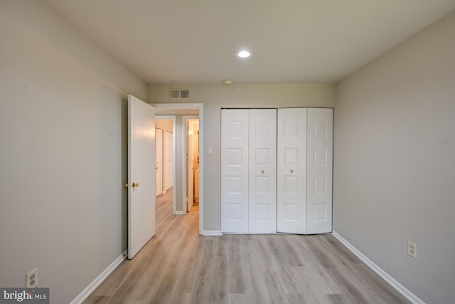 5241 W Running Brook Rd Unit 302, Columbia, MD 21044 - unfurnished bedroom featuring light wood finished floors, baseboards, recessed lighting, and a closet